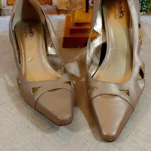 Women's heels by Coach and Four